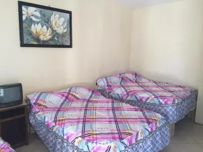 Cama o camas de una habitación en Blanquita guesthouse