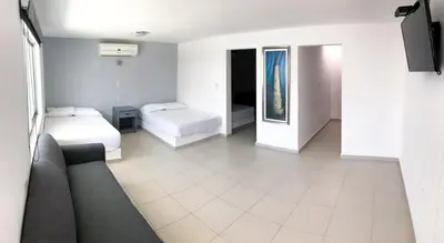 Cama o camas de una habitación en Mona Inn