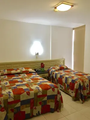 Cama o camas de una habitación en Hotel del Valle