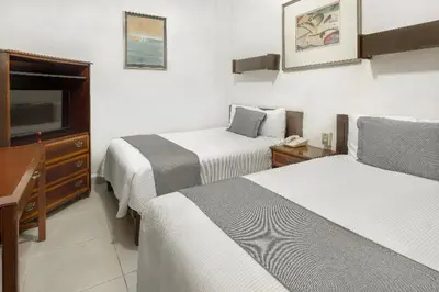 Cama o camas de una habitación en Hotel Premier Saltillo Coahuila