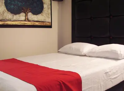 Cama o camas de una habitación en Hotel Inn Plaza del Ángel Chihuahua