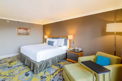 Cama o camas de una habitación en Hotel Lucerna Ciudad Juarez