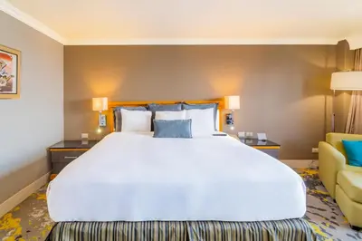 Cama o camas de una habitación en Hotel Lucerna Ciudad Juarez