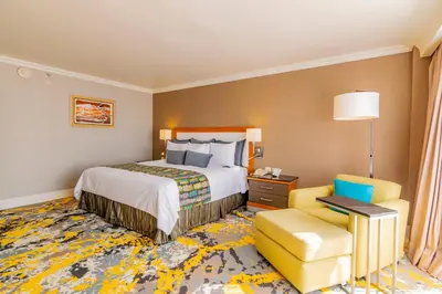 Cama o camas de una habitación en Hotel Lucerna Ciudad Juarez