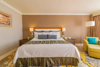 Cama o camas de una habitación en Hotel Lucerna Ciudad Juarez