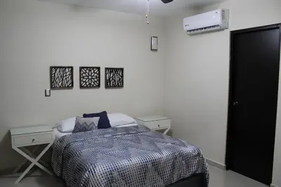 Cama o camas de una habitación en Departamento zona dorada
