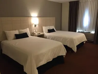 Cama o camas de una habitación en Casa Grande Delicias