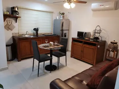 Una cocina o zona de cocina en Departamentos con Alberca