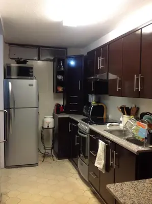 Una cocina o zona de cocina en Departamentos con Alberca