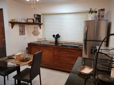 Una cocina o zona de cocina en Departamentos con Alberca