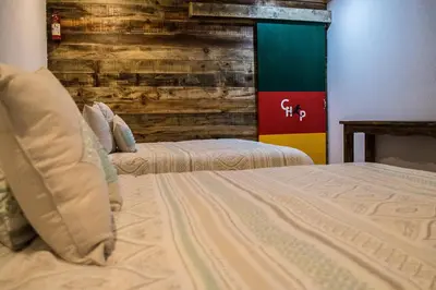 Cama o camas de una habitación en Hotel La Estacion