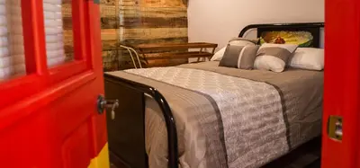 Cama o camas de una habitación en Hotel La Estacion