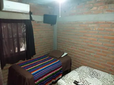 Una televisión o centro de entretenimiento en Posada Don Jose