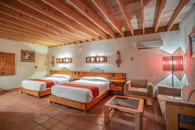 Cama o camas de una habitación en Termas de San Joaquin