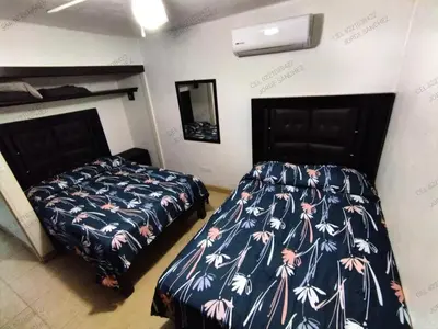 Cama o camas de una habitación en Condominio 231 Loma Bonita, enfrente de la alberca!