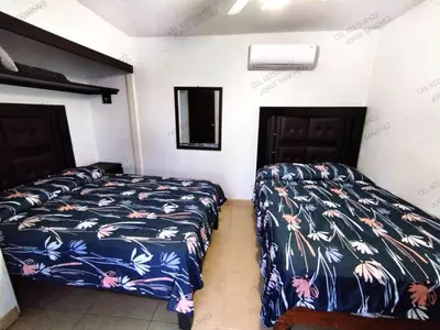 Cama o camas de una habitación en Condominio 231 Loma Bonita, enfrente de la alberca!
