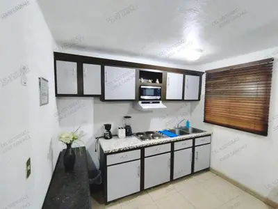 Una cocina o zona de cocina en Condominio 231 Loma Bonita, enfrente de la alberca!