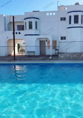 Piscina en o cerca de Condominio 303 Loma Bonita, enfrente de la alberca!