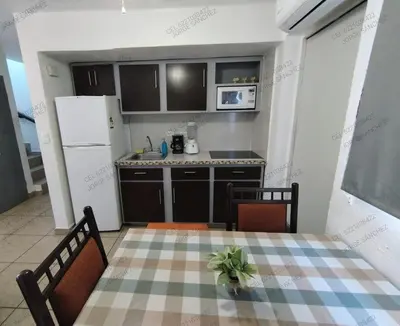 Una cocina o zona de cocina en Condominio 303 Loma Bonita, enfrente de la alberca!