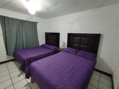 Cama o camas de una habitación en Condominio 303 Loma Bonita, enfrente de la alberca!