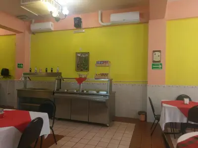 Un restaurante o sitio para comer en Hoteles Santa Regina