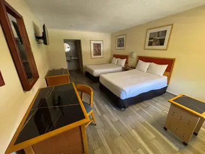 Cama o camas de una habitación en Hotel Colonial Ciudad Juarez