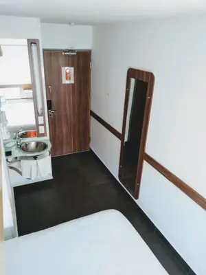 Una cocina o zona de cocina en Hotel Hi ! Torreon Aeropuerto-Galerías