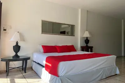 Cama o camas de una habitación en Hotel Posada Doña Rubino