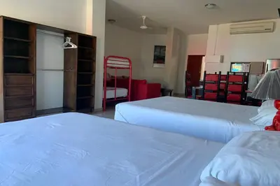 Cama o camas de una habitación en Hotel Posada Doña Rubino