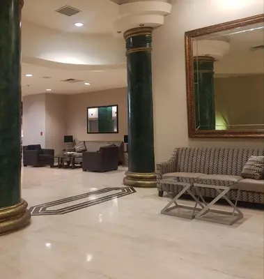 Una televisión o centro de entretenimiento en Hotel San Marcos Express