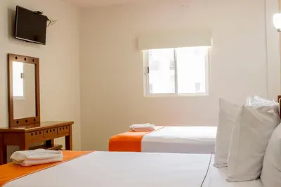 Cama o camas de una habitación en Gran Hotel Residencial Galerias