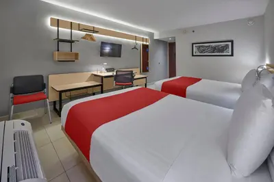 Una televisión o centro de entretenimiento en City Express by Marriott Los Mochis