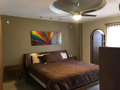 Cama o camas de una habitación en Marina Nopolo Condos