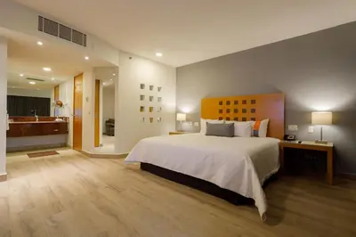 Cama o camas de una habitación en Real Inn Torreon
