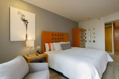 Cama o camas de una habitación en Real Inn Torreon