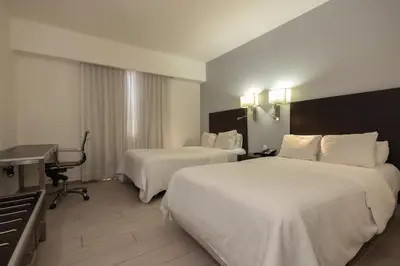 Cama o camas de una habitación en Fiesta Inn Nogales