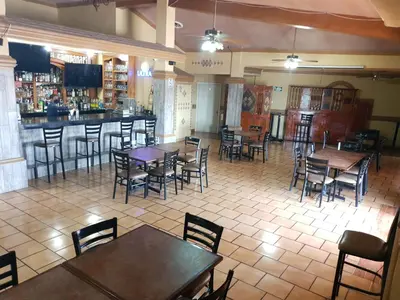 Un restaurante o sitio para comer en Hotel Posada Santa Fe Sabinas