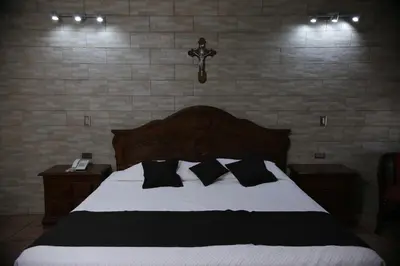Cama o camas de una habitación en Hotel Posada Santa Fe Sabinas
