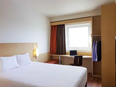 Cama o camas de una habitación en Ibis Hermosillo