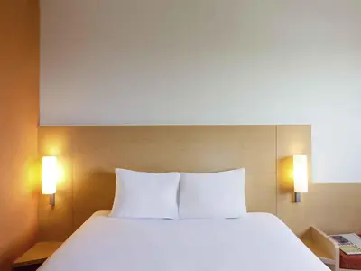 Cama o camas de una habitación en Ibis Hermosillo