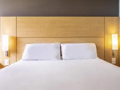 Cama o camas de una habitación en Ibis Chihuahua