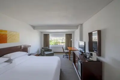 Cama o camas de una habitación en Fiesta Americana Hermosillo