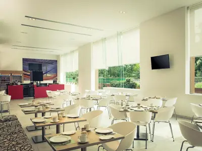 Una televisión o centro de entretenimiento en Fiesta Inn Culiacan