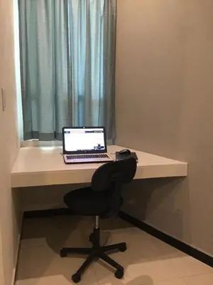 Una televisión o centro de entretenimiento en Privatto Suites