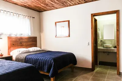 Cama o camas de una habitación en Hotel María del Tío Molcas