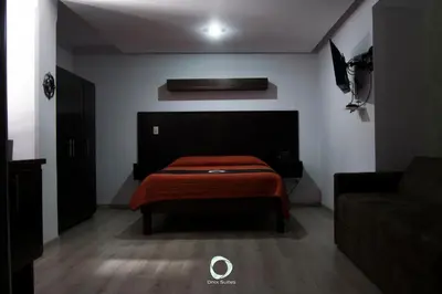 Cama o camas de una habitación en Hotel Onix Suites
