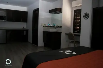 Cama o camas de una habitación en Hotel Onix Suites