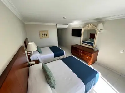 Cama o camas de una habitación en Hotel Sands Arenas