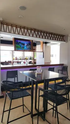 Un restaurante o sitio para comer en Hacienda Mazatlán sea view