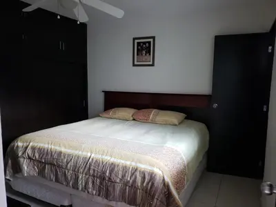 Cama o camas de una habitación en Departamentos Mazatlán